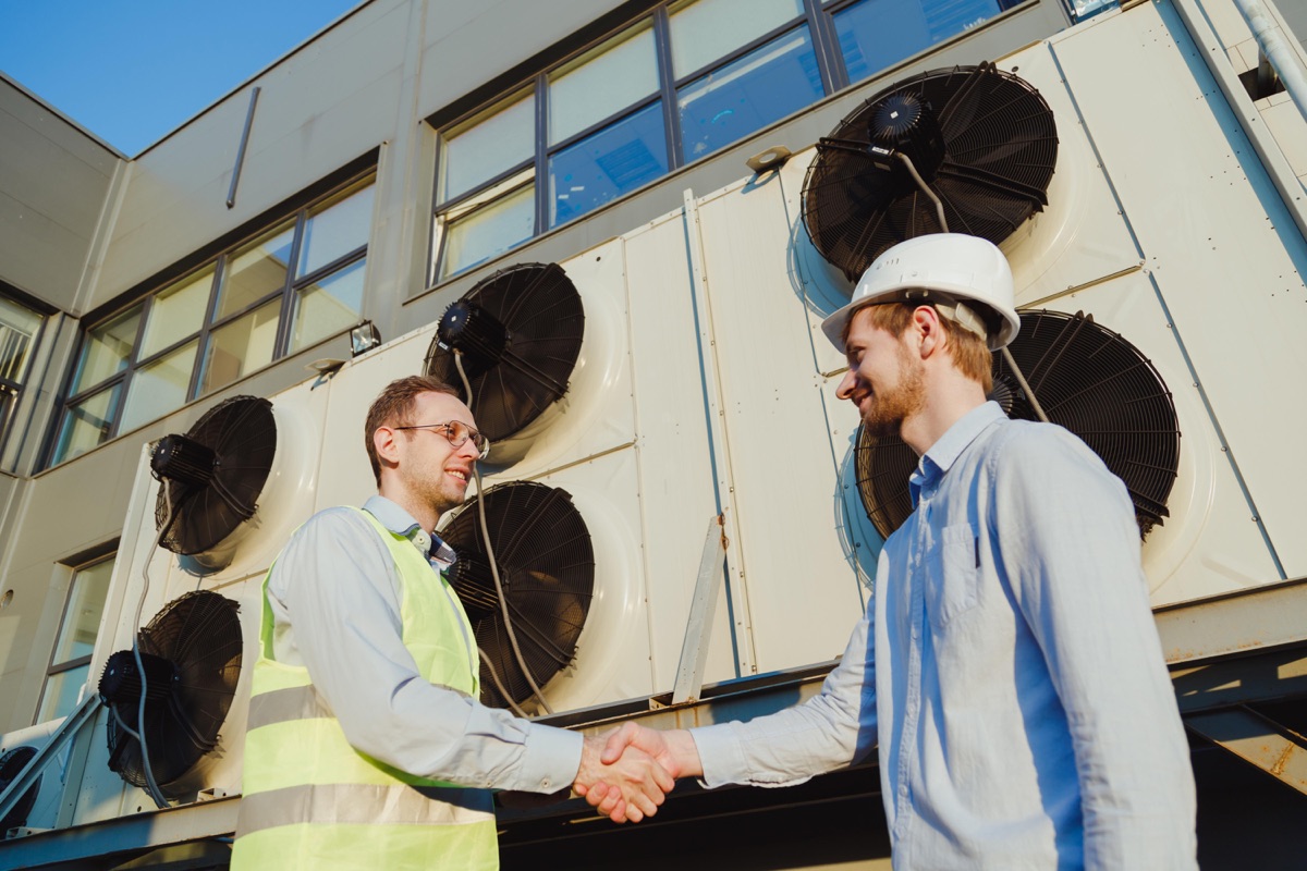 HVAC contractor meeting with customer